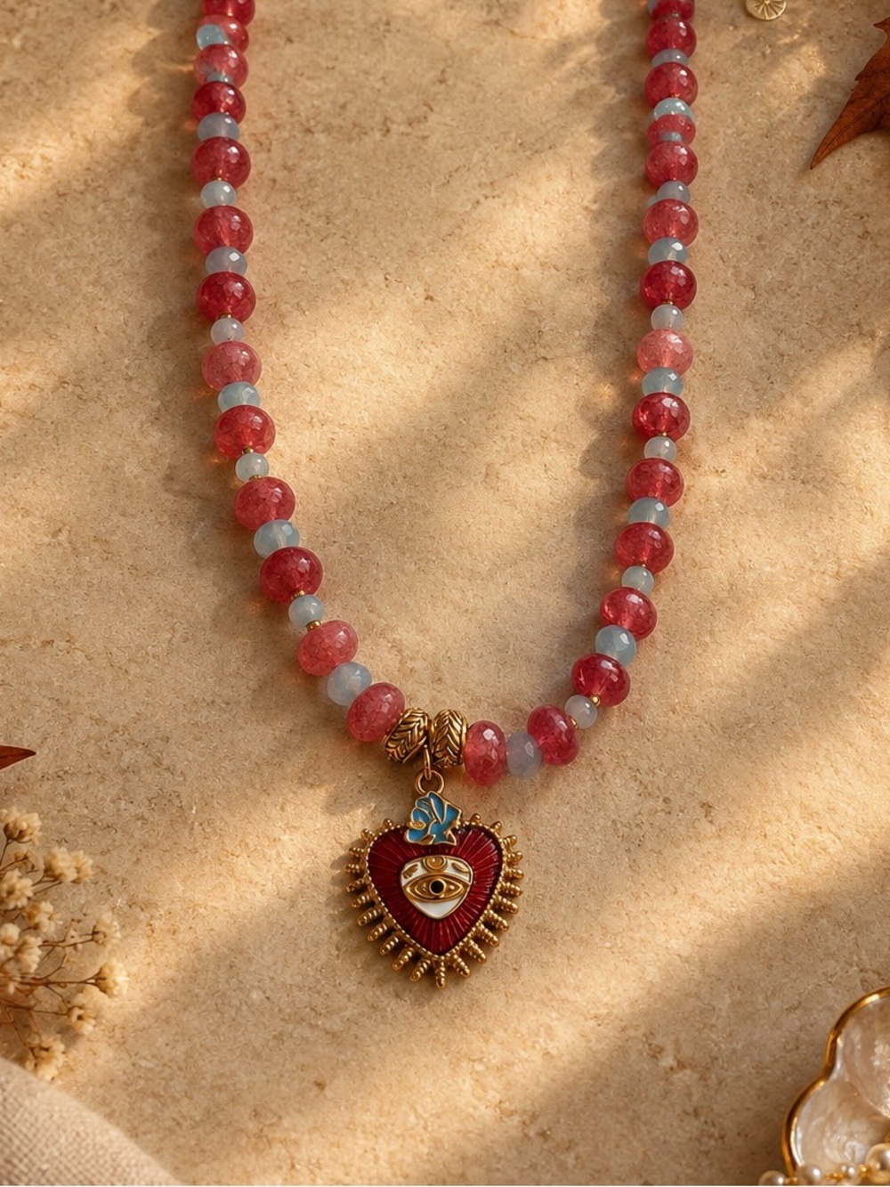 Red and Blue Beaded Necklace with Gold Plated Vintage Heart Charm Evil Evil